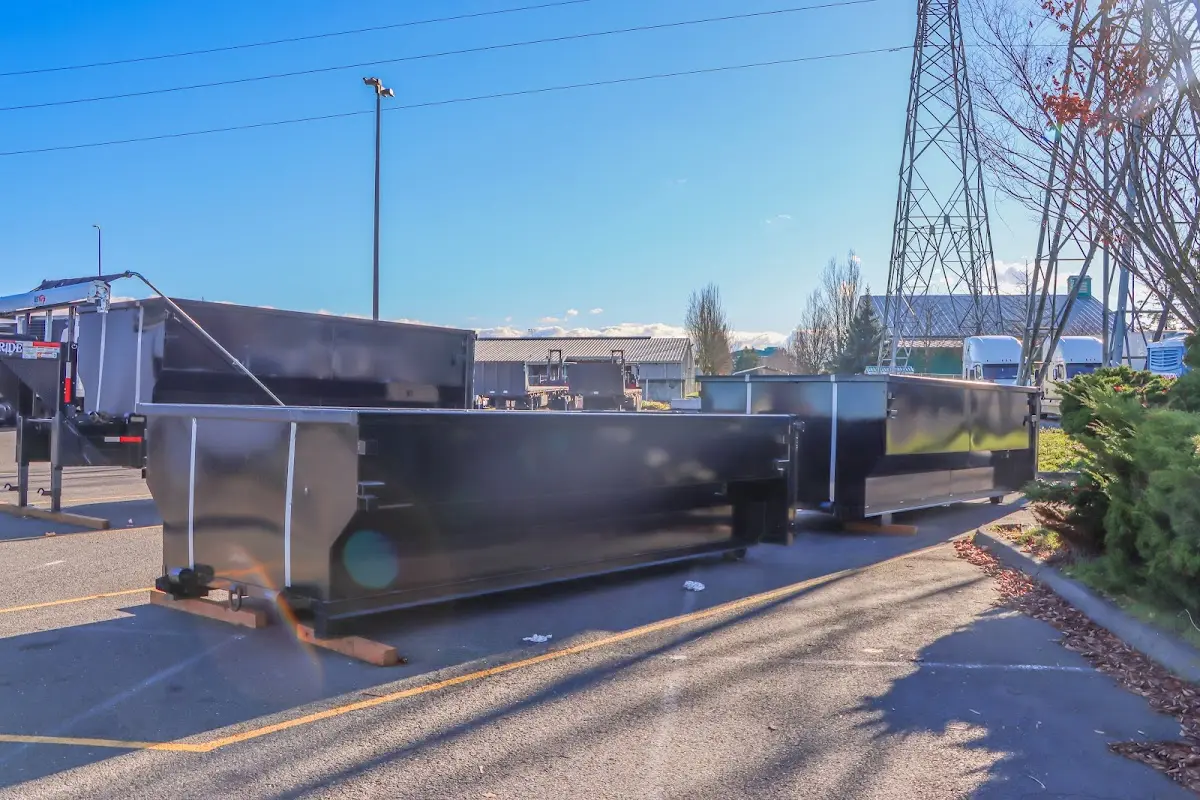 Roll-off dumpster ready for waste disposal at job site for 6 Yard Dumpster Rental in Hamilton